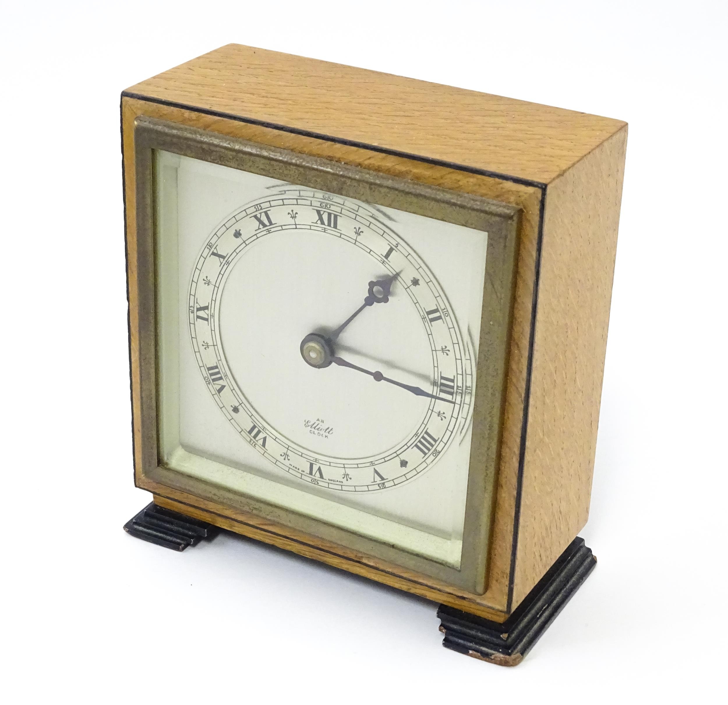 A 20thC mantle clock by Elliott. the dial with Roman numeral chapter ring and signed ' An Elliott - Image 8 of 8