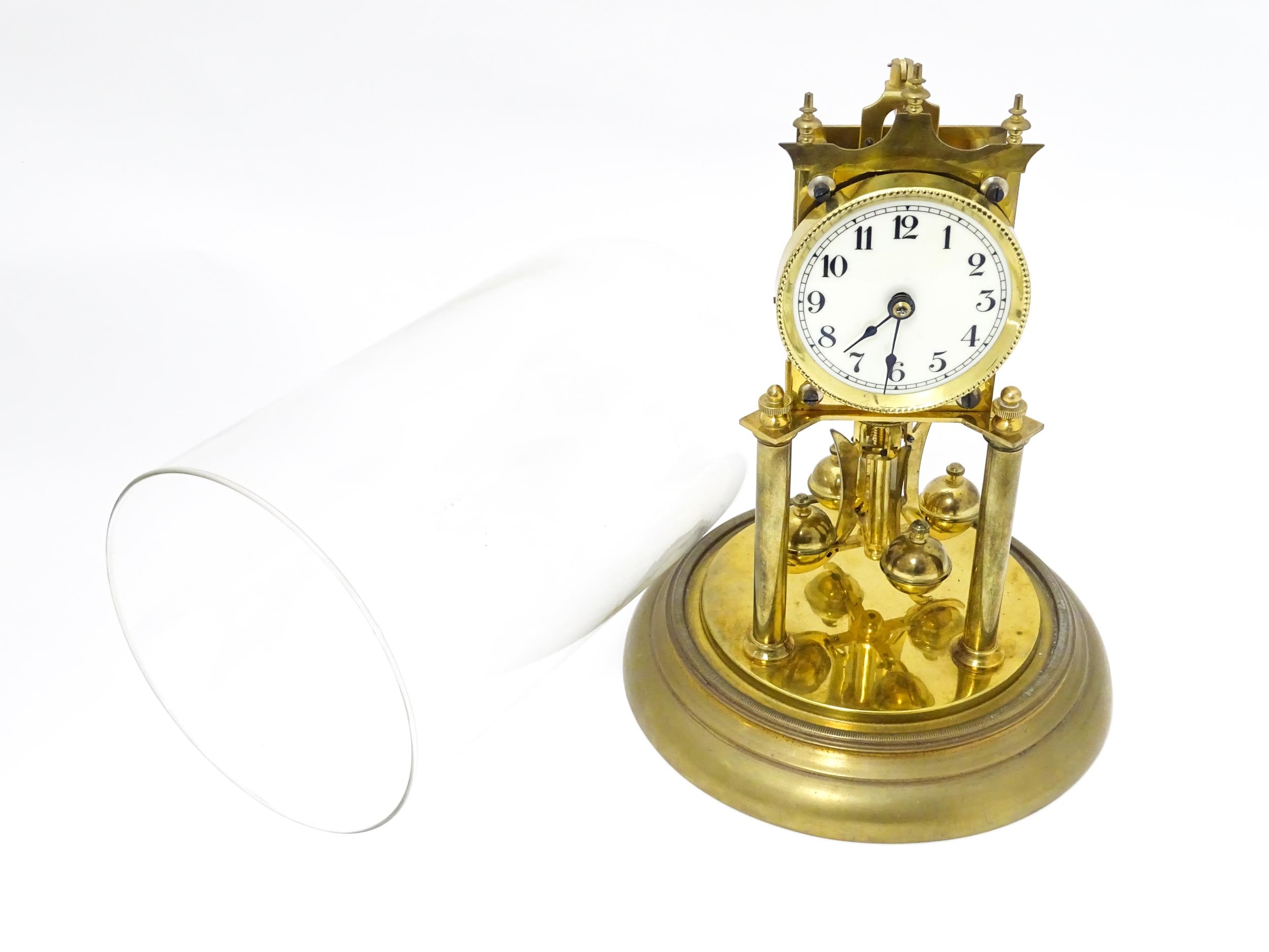 A 20thC anniversary / table clock with white enamel dial and Roman numerals. Under glass dome - Image 4 of 12
