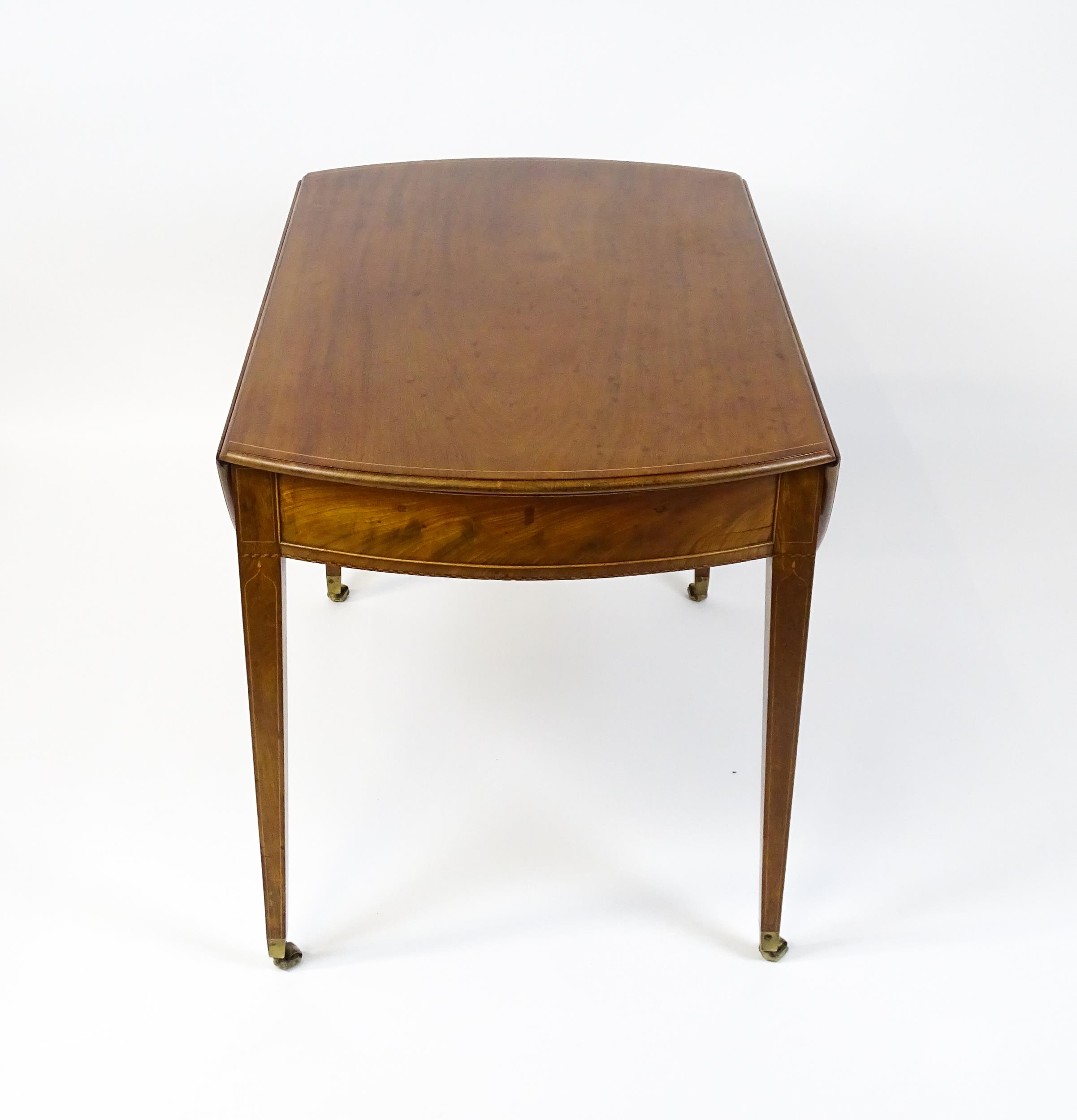 An early 19thC mahogany Pembroke table with a satinwood strung top above a single frieze drawer - Image 2 of 11