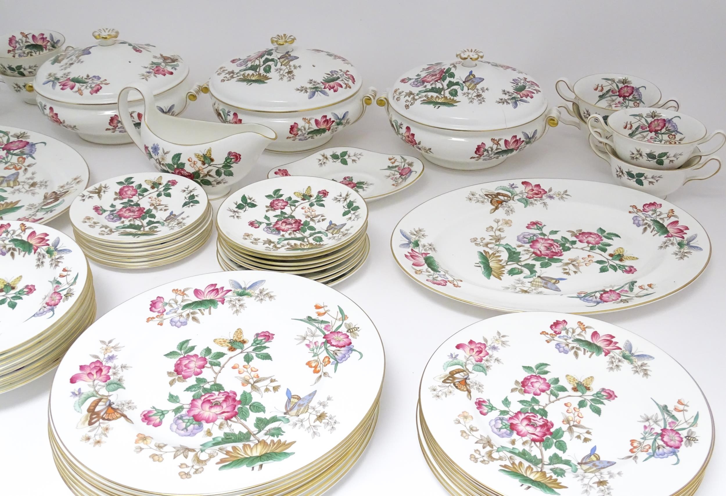 A quantity of Wedgwood dinner wares in the Charnwood pattern to include plates, twin handles soup - Image 11 of 25