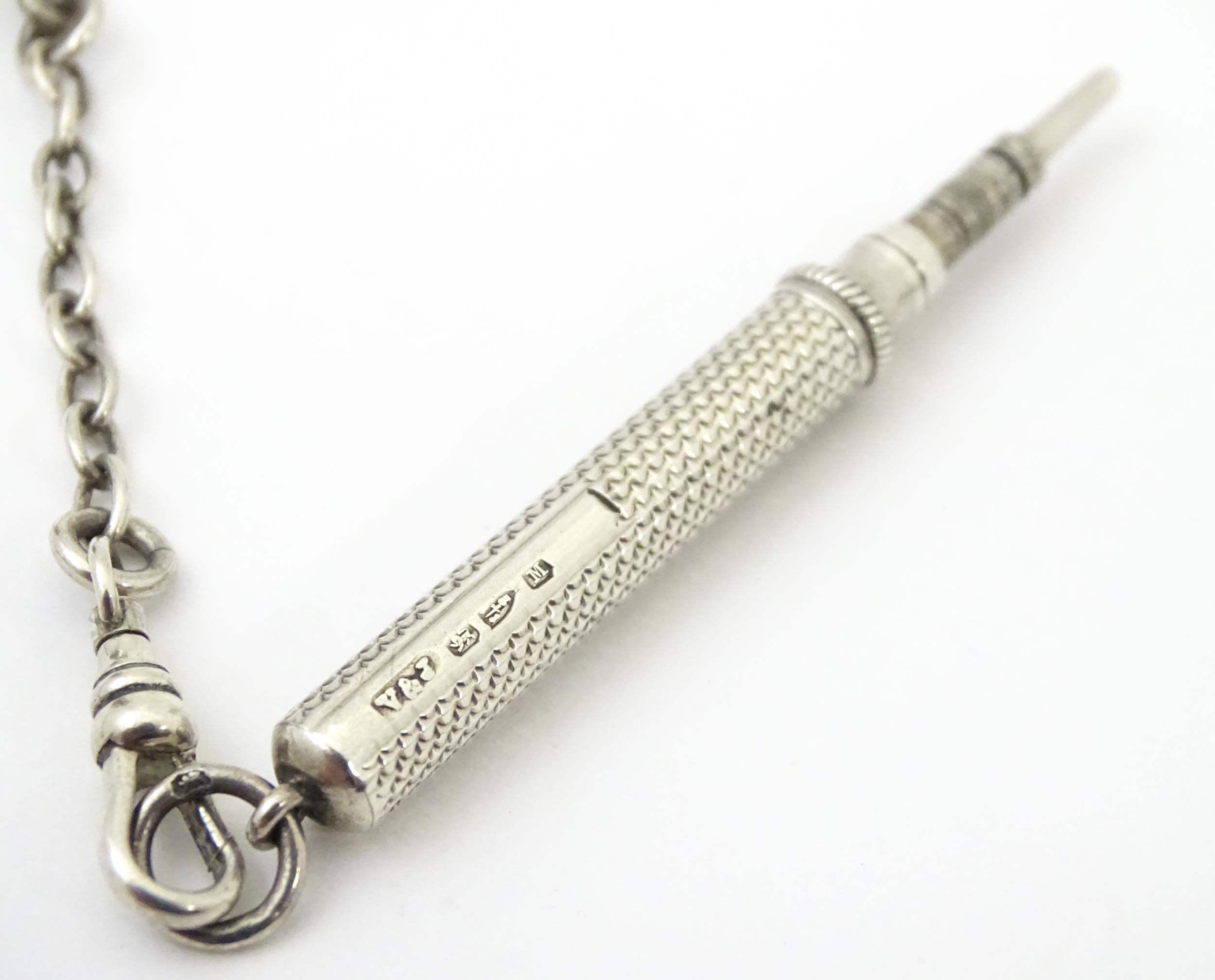 A silver chatelaine with openwork scrolling detail and having five chains, hallmarked Chester - Image 13 of 19