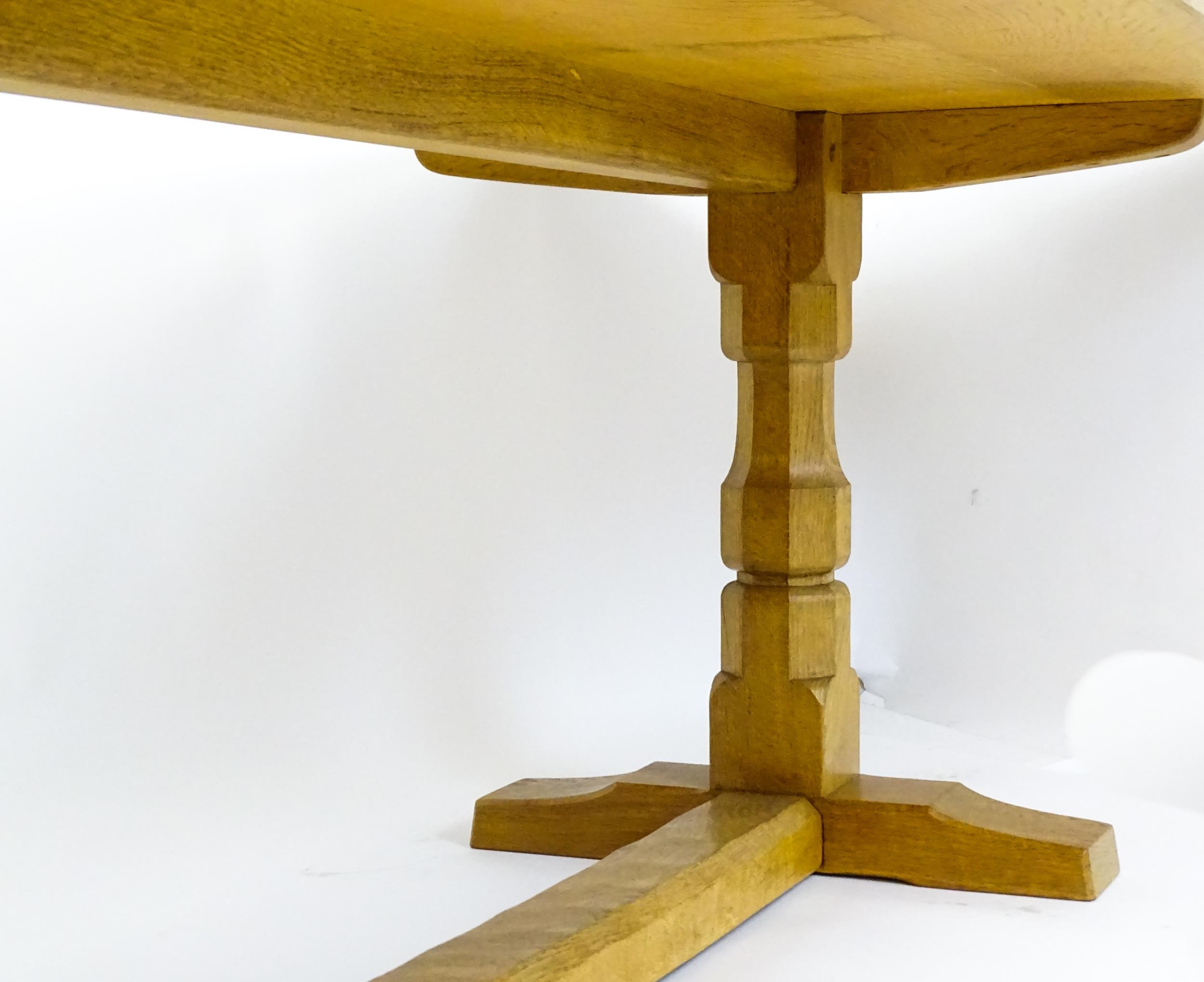 A mid 20thC Robert 'Mouseman' Thompson dining table. The 8ft long oak table top with an adzed finish - Image 11 of 22