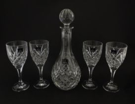 Four cut glass wine glasses and decanter by Royal Doulton. Boxed. Decanter approx. 10 1/4" high