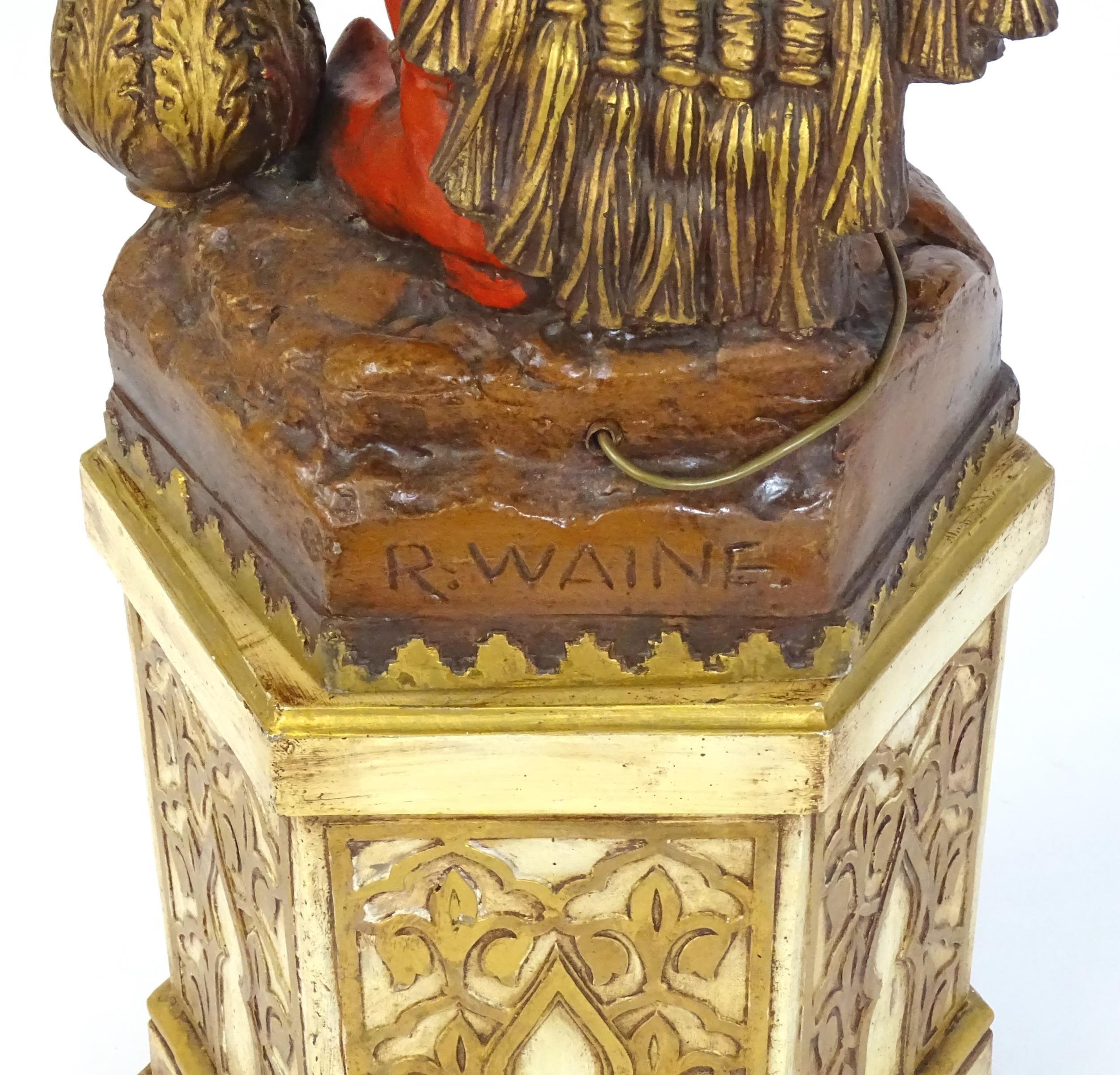 A mid 20thC blackamoor lamp, the lamp having a polychrome figural top grasping a torchiere, the - Image 13 of 14