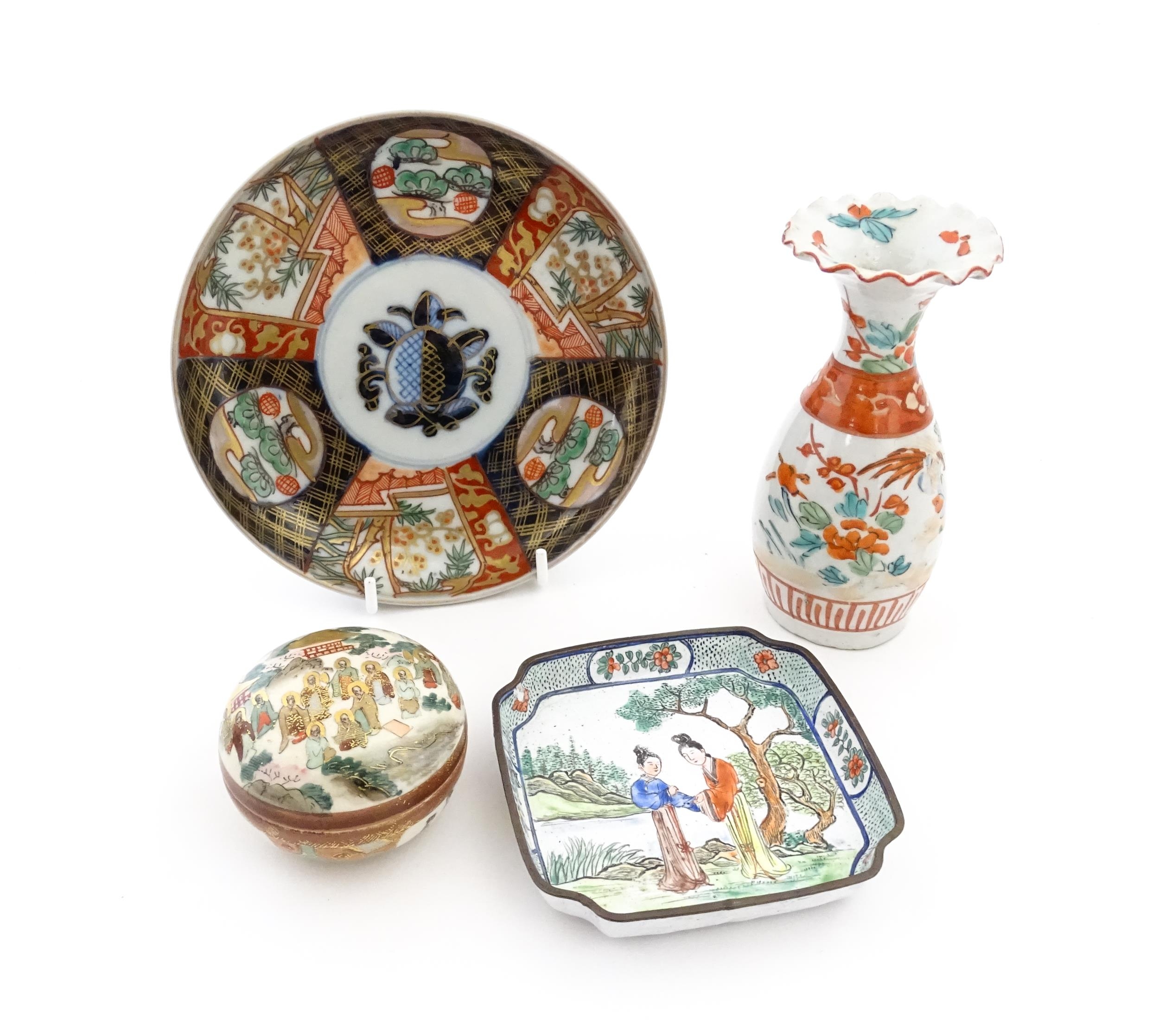 Four Oriental items comprising a dish decorated in the Imari palette, a Japanese Satsuma pot and