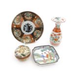 Four Oriental items comprising a dish decorated in the Imari palette, a Japanese Satsuma pot and