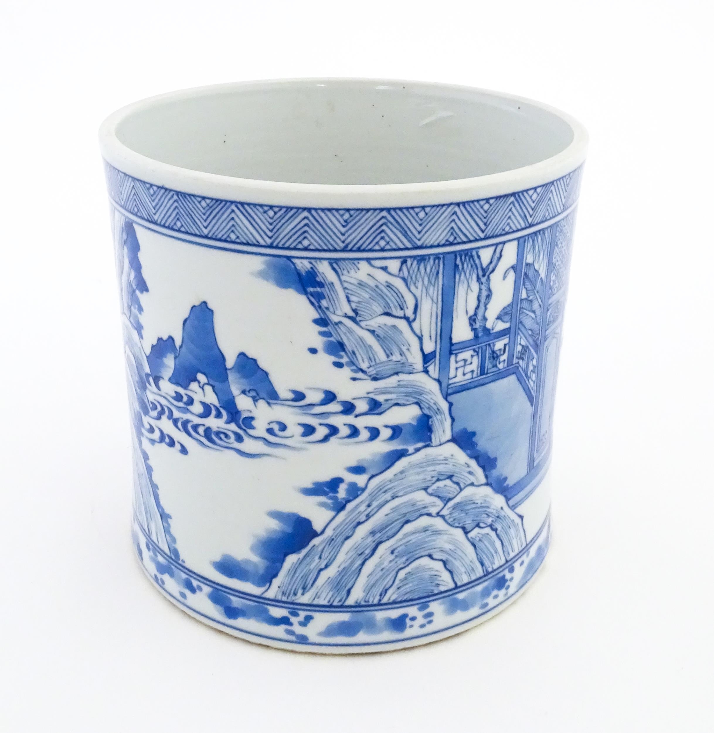 A Chinese blue and white vase / planter decorated with figures in a garden setting with a feast, and - Image 4 of 8