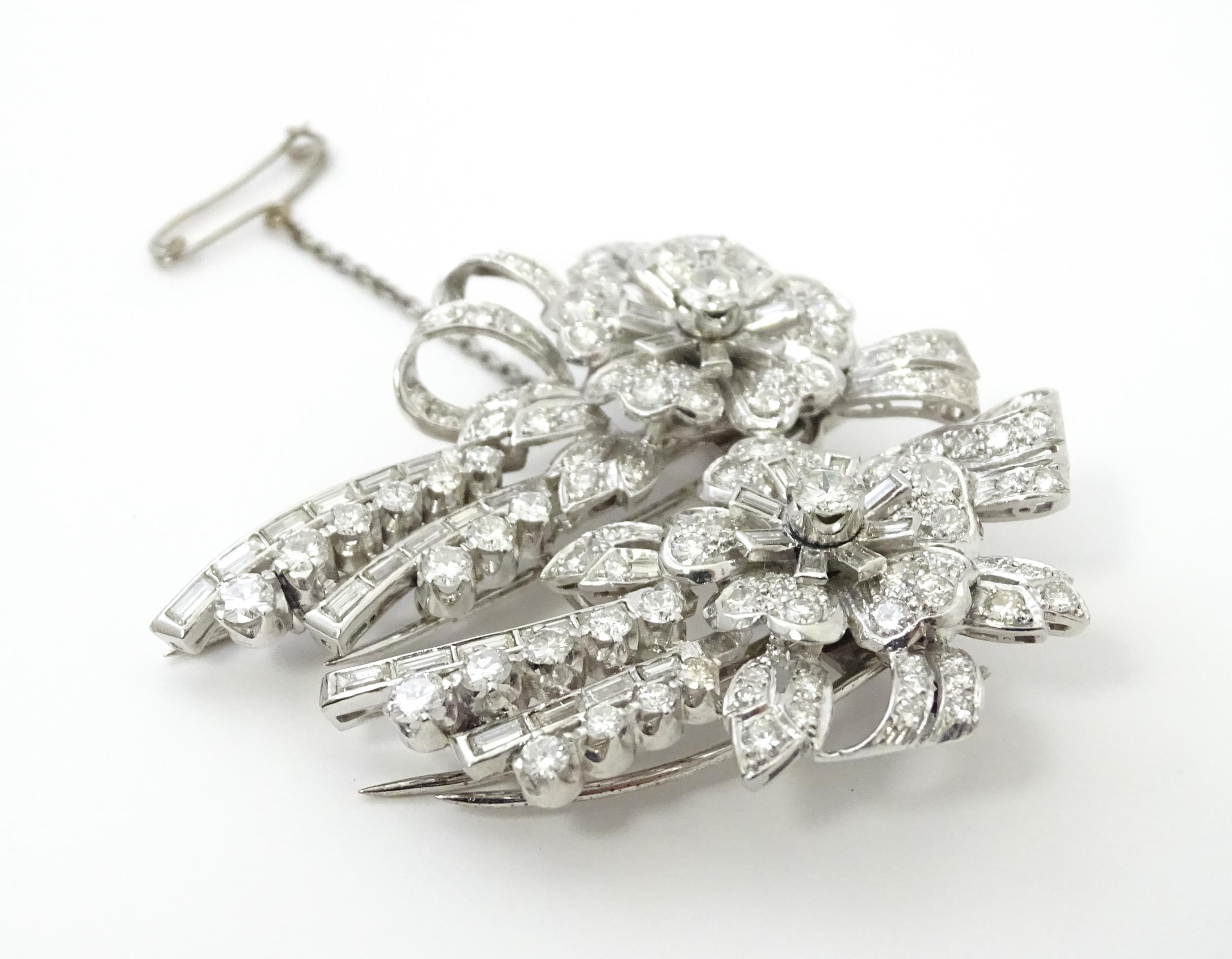 A diamond double clip brooch, the clips with flower and bow detail set with a profusion of - Image 4 of 11