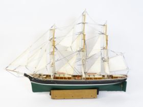A 20thC scale model of a ship titled Rambler to hull. Approx. 53 1/2" long Please Note - we do not