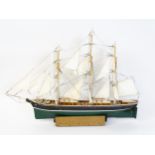 A 20thC scale model of a ship titled Rambler to hull. Approx. 53 1/2" long Please Note - we do not