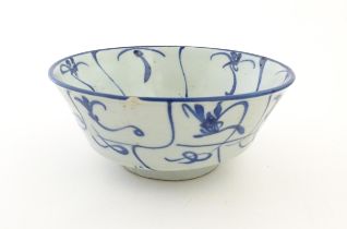 A Chinese blue and white Tek Sing Cargo bowl decorated in the lotus pattern. Approx. 2 3/4" high x 6