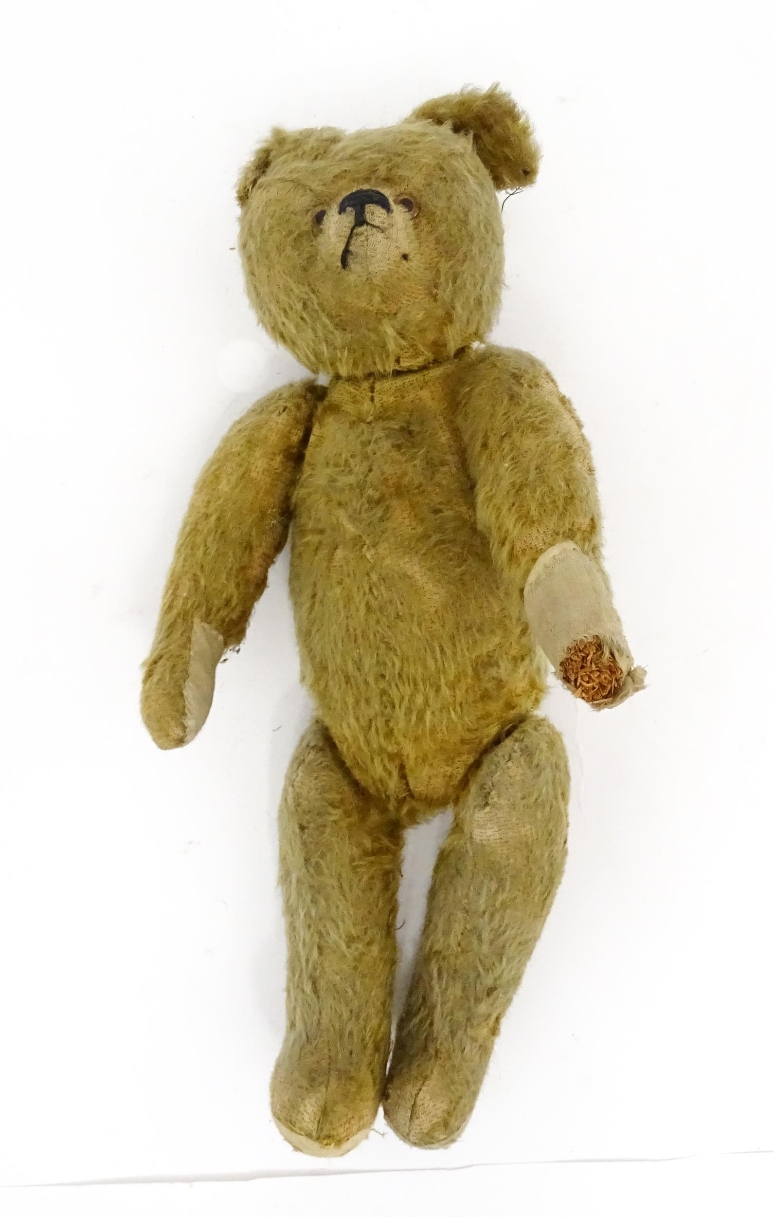 Toy: An early 20thC mohair straw filled teddy bear with proud nose, stitched mouth, hump back, - Image 5 of 9