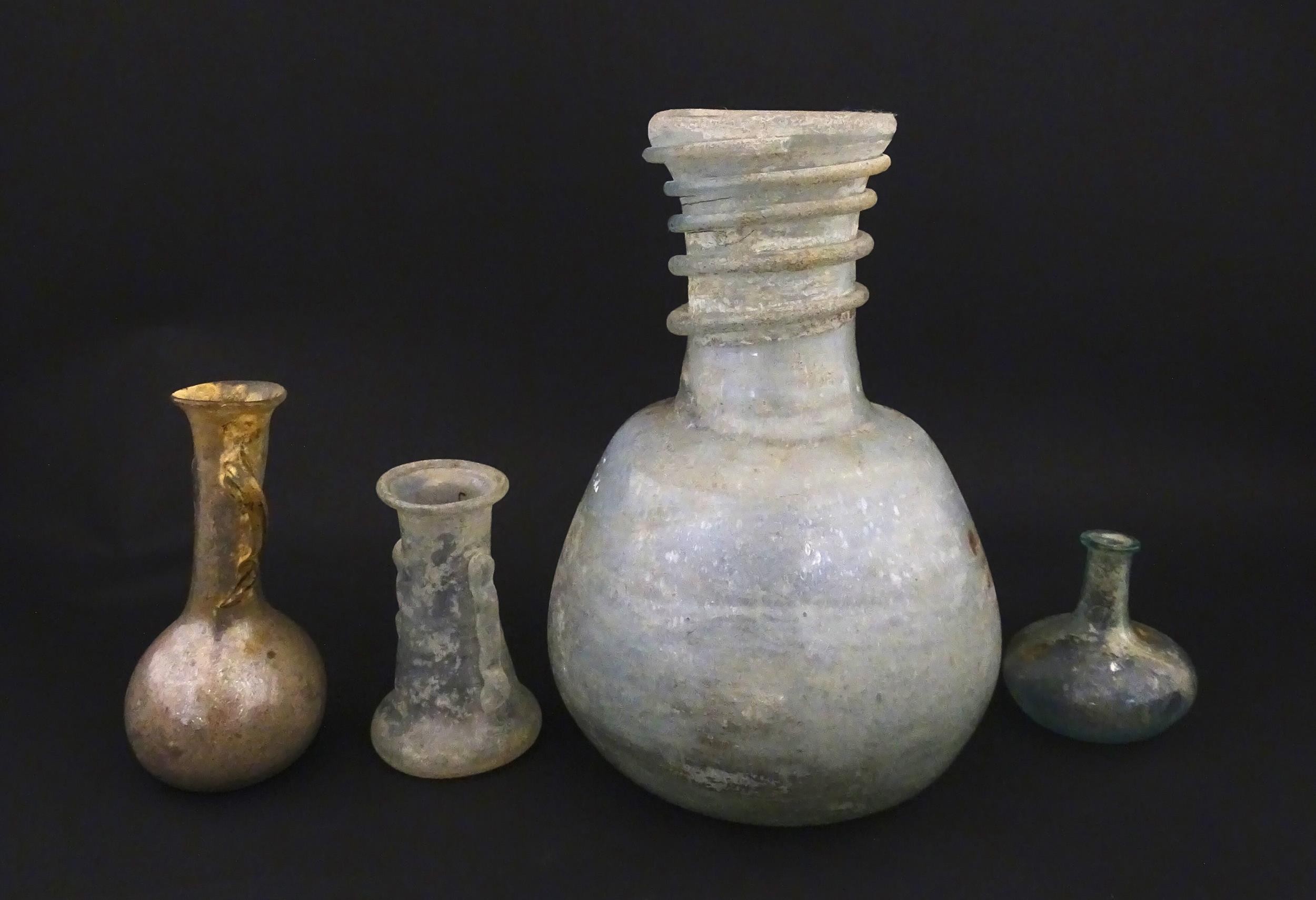 Four glass vases in the Roman style with iridescent finish, some with trail detail. Largest - Image 3 of 6