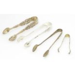Four assorted silver sugar tongs, to include and Albany pattern example hallmarked Sheffield 1903,