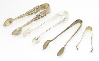 Four assorted silver sugar tongs, to include and Albany pattern example hallmarked Sheffield 1903,