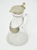 A glass whisky water noggin / jug with silver lid, hallmarked Birmingham 1916 maker Hukin & Heath