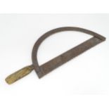 A 19thC bow saw , with arc frame and wooden handle, approx 23" long Please Note - we do not make