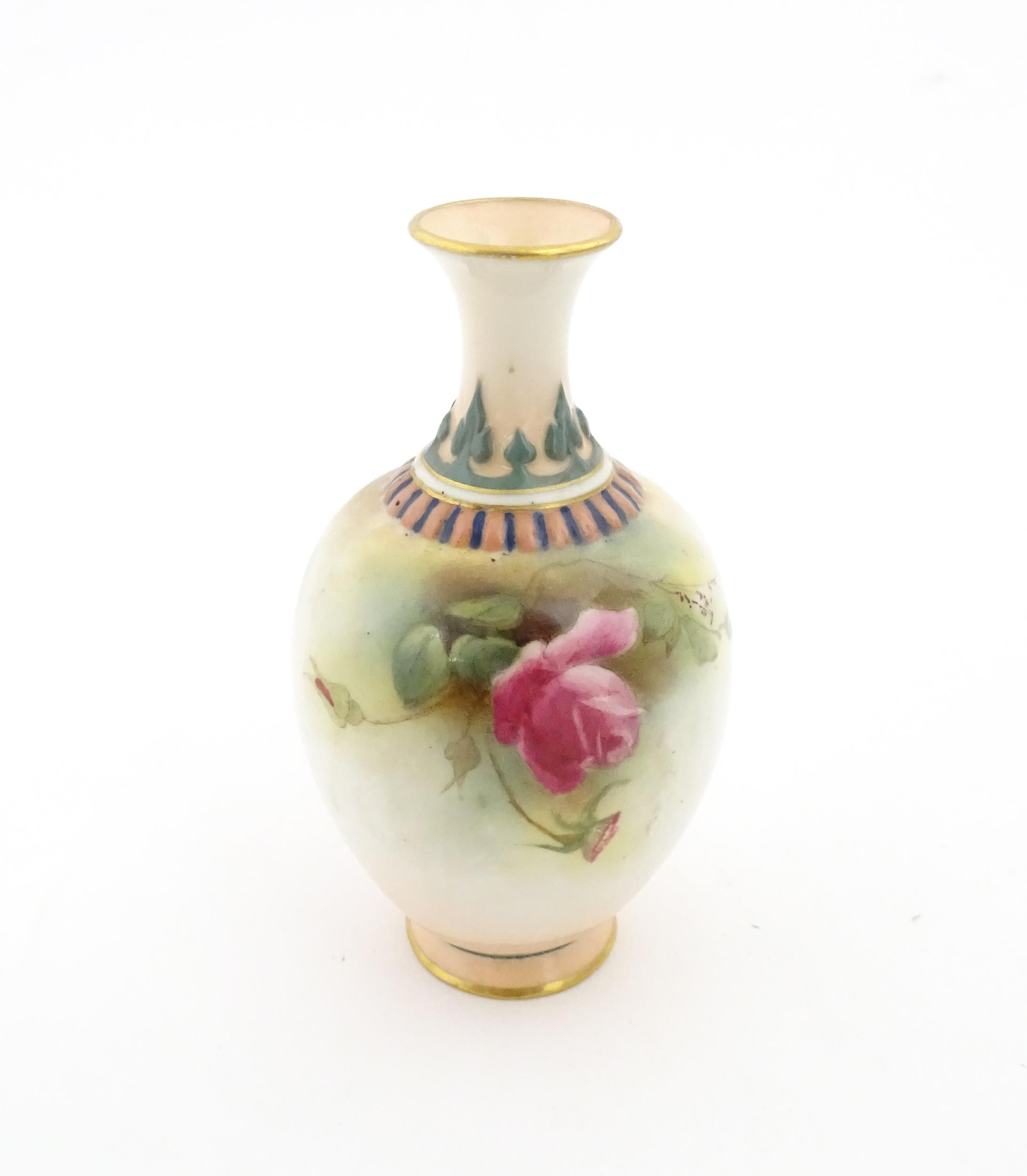 A Royal Worcester vase with hand painted decoration depicting pink and yellow roses, with gilt - Image 4 of 7