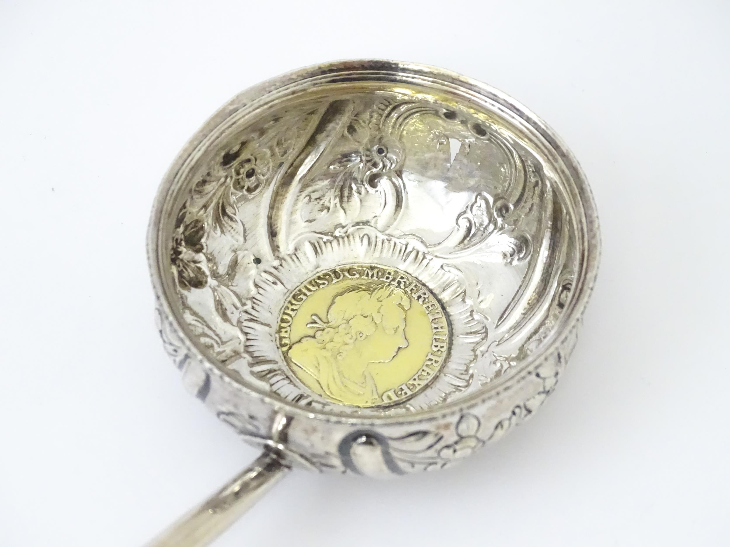 A white metal punch ladle with coin style detail to bowl. Approx 11" long overall Please Note - we - Image 4 of 6