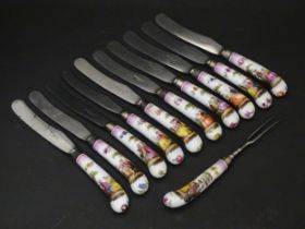 A set of ten 19thC knives with porcelain pistol grip handles with hand painted decoration