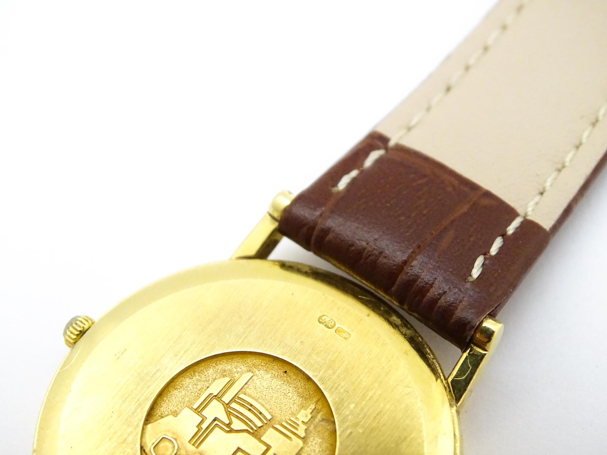 An Omega 18ct gold cased De Ville wristwatch, the dial with hour batons and date aperture. Watch - Image 11 of 17