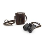 An early 20thC cased pair of binoculars by Ross, 111 New Bond St, London, the body stamped 'Ross,