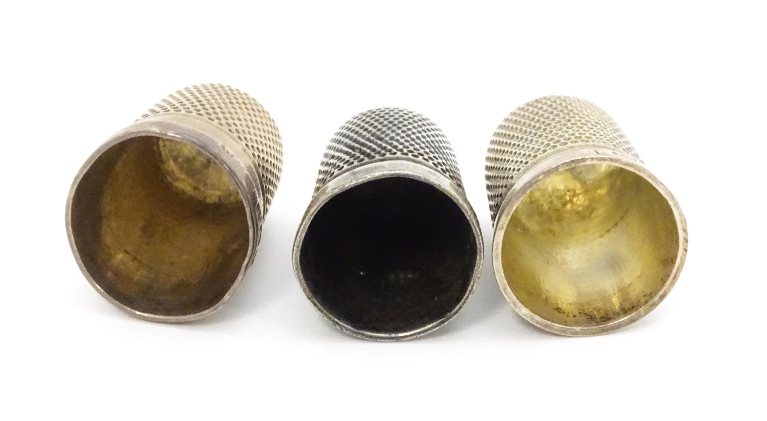 Three silver thimbles hallmarked Birmingham 1926 maker Northern Goldsmiths Co., Chester 1892 maker G - Image 2 of 5