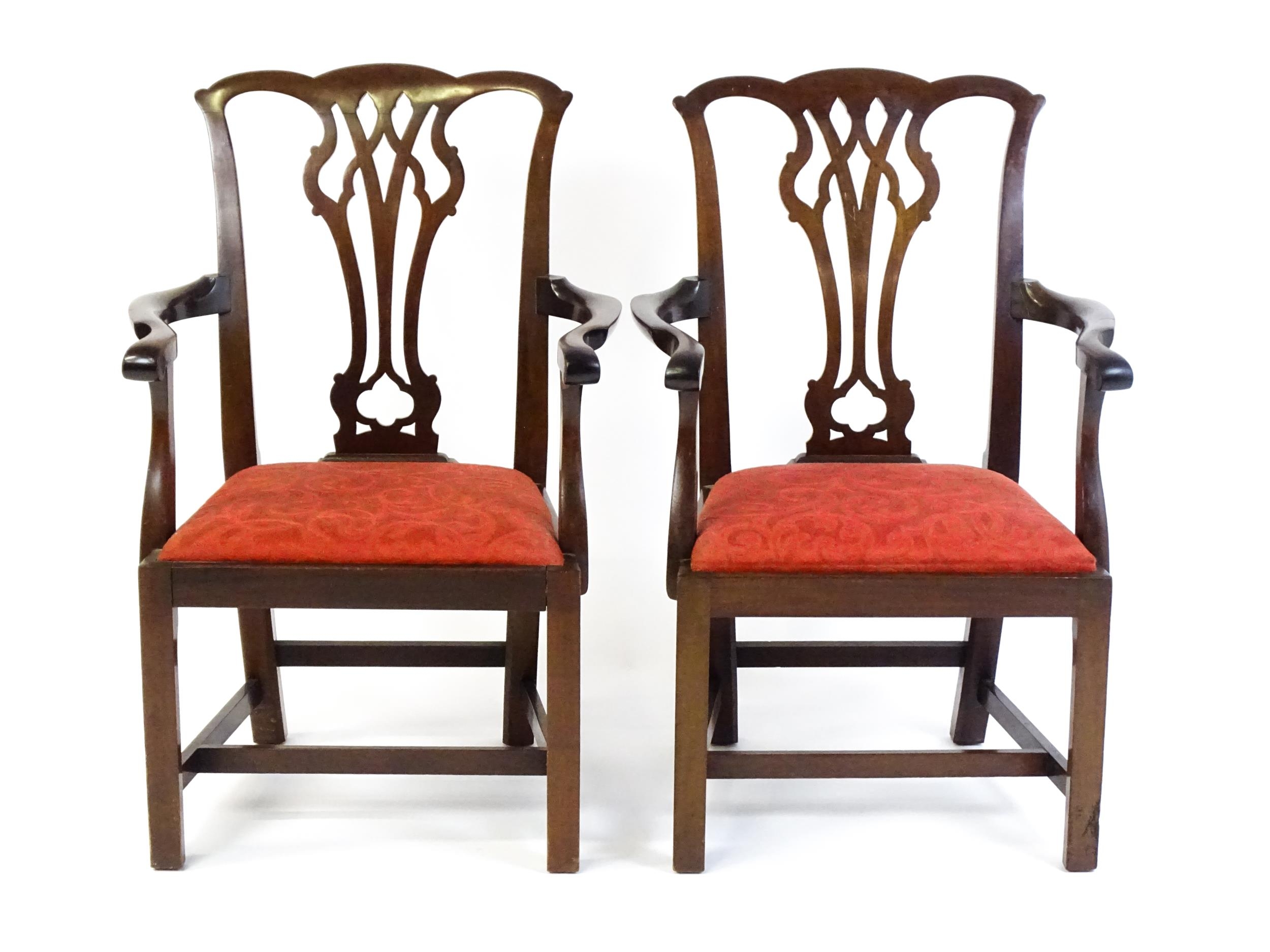 A pair of Chippendale style mahogany elbow chairs with a drop in seat raised on chamfered legs - Image 5 of 7
