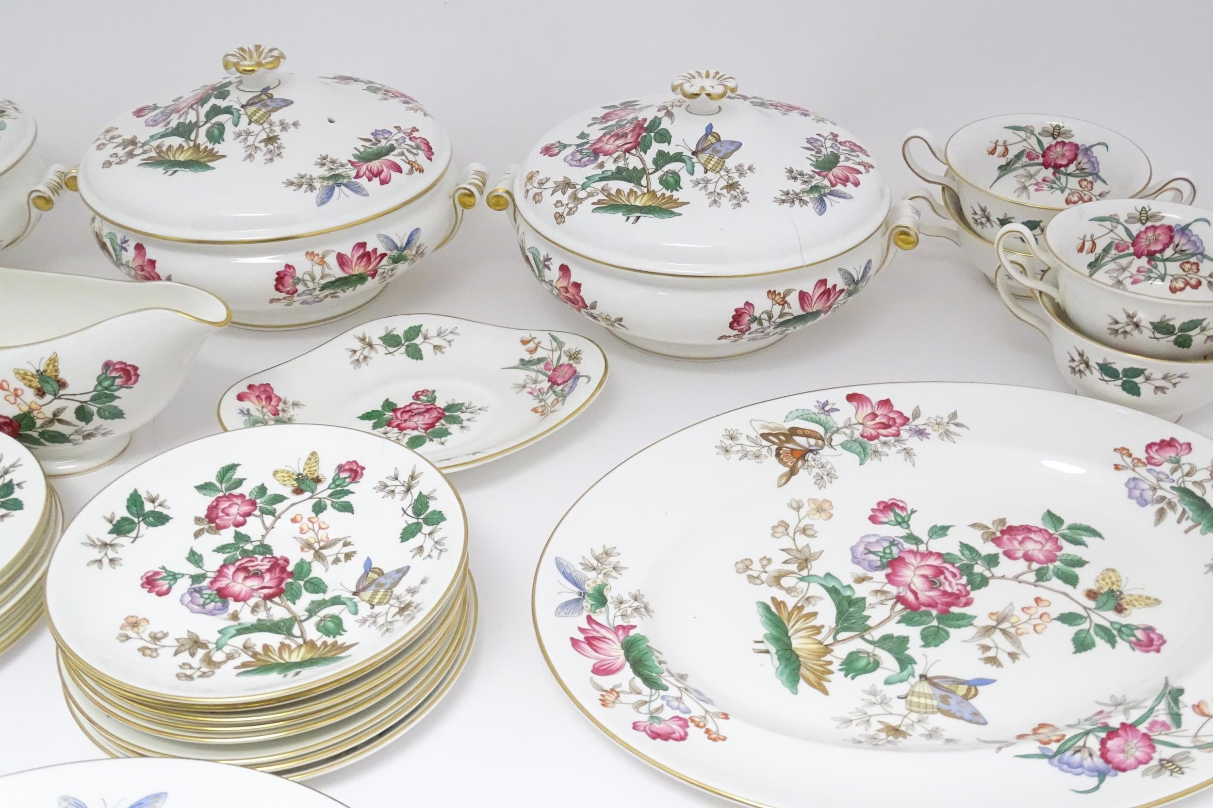 A quantity of Wedgwood dinner wares in the Charnwood pattern to include plates, twin handles soup - Image 6 of 25