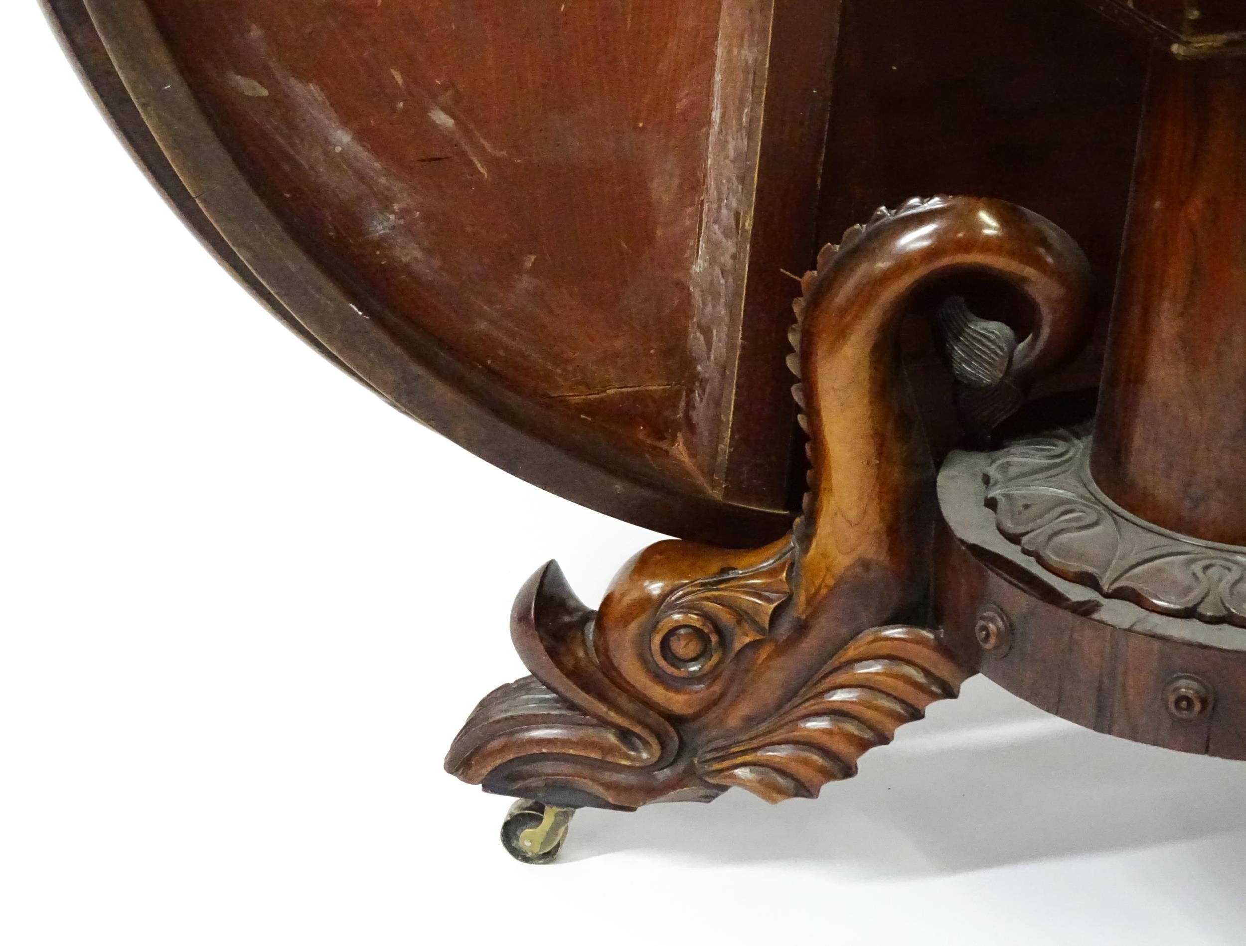 A 19thC dining table with an olive wood veneered circular top raised on a rosewood pedestal with - Image 8 of 15
