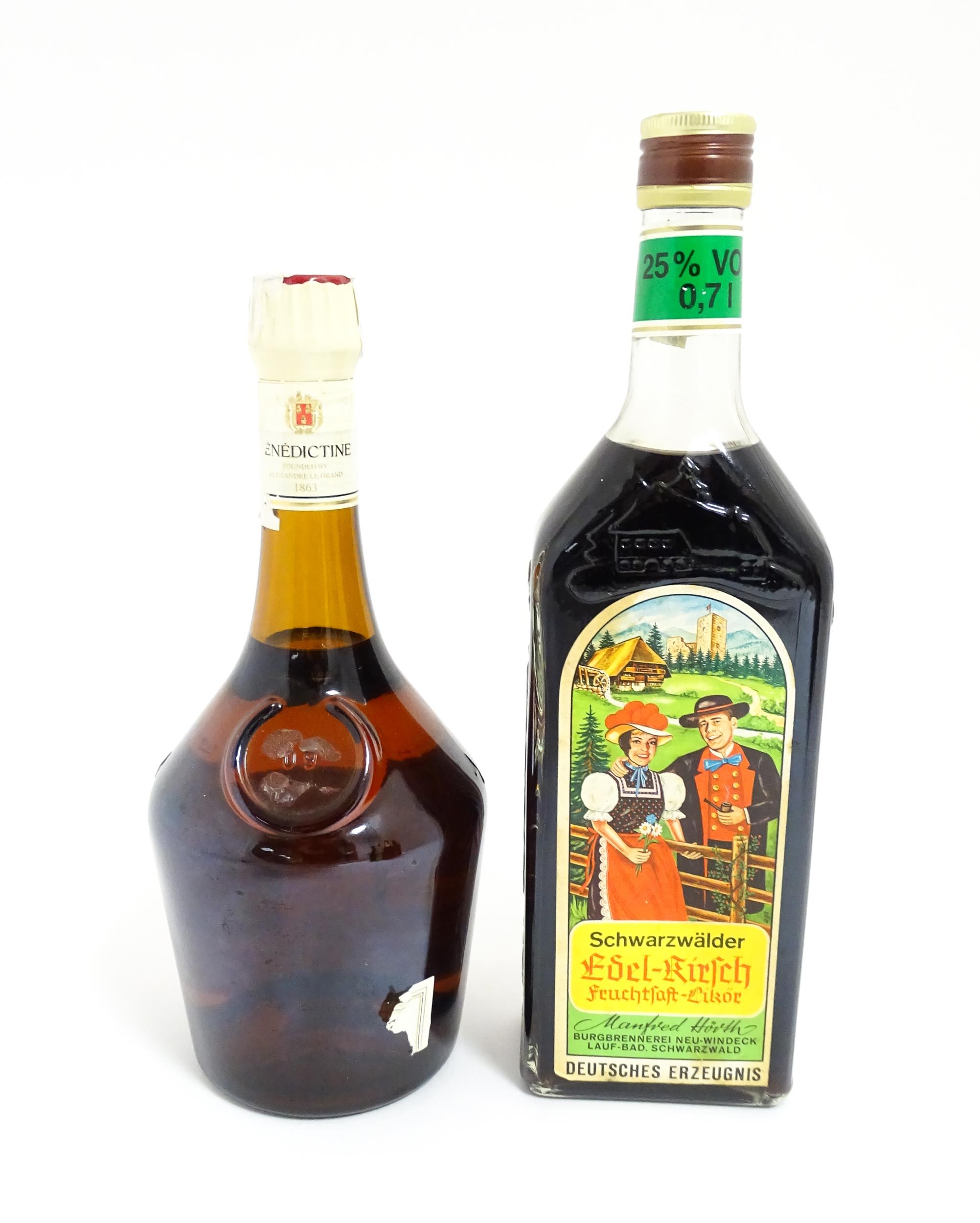 A 70cl bottle of Benedictine liqueur, together with a 70cl bottle of Schwarzwälder Edel-Kirsch