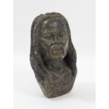Ethnographic / Native / Tribal : An African carved soapstone bust modelled as a man with dreadlocks.