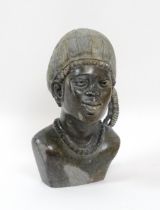 Ethnographic / Native / Tribal : An African carved soapstone bust modelled as a woman wearing a