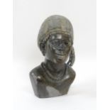 Ethnographic / Native / Tribal : An African carved soapstone bust modelled as a woman wearing a