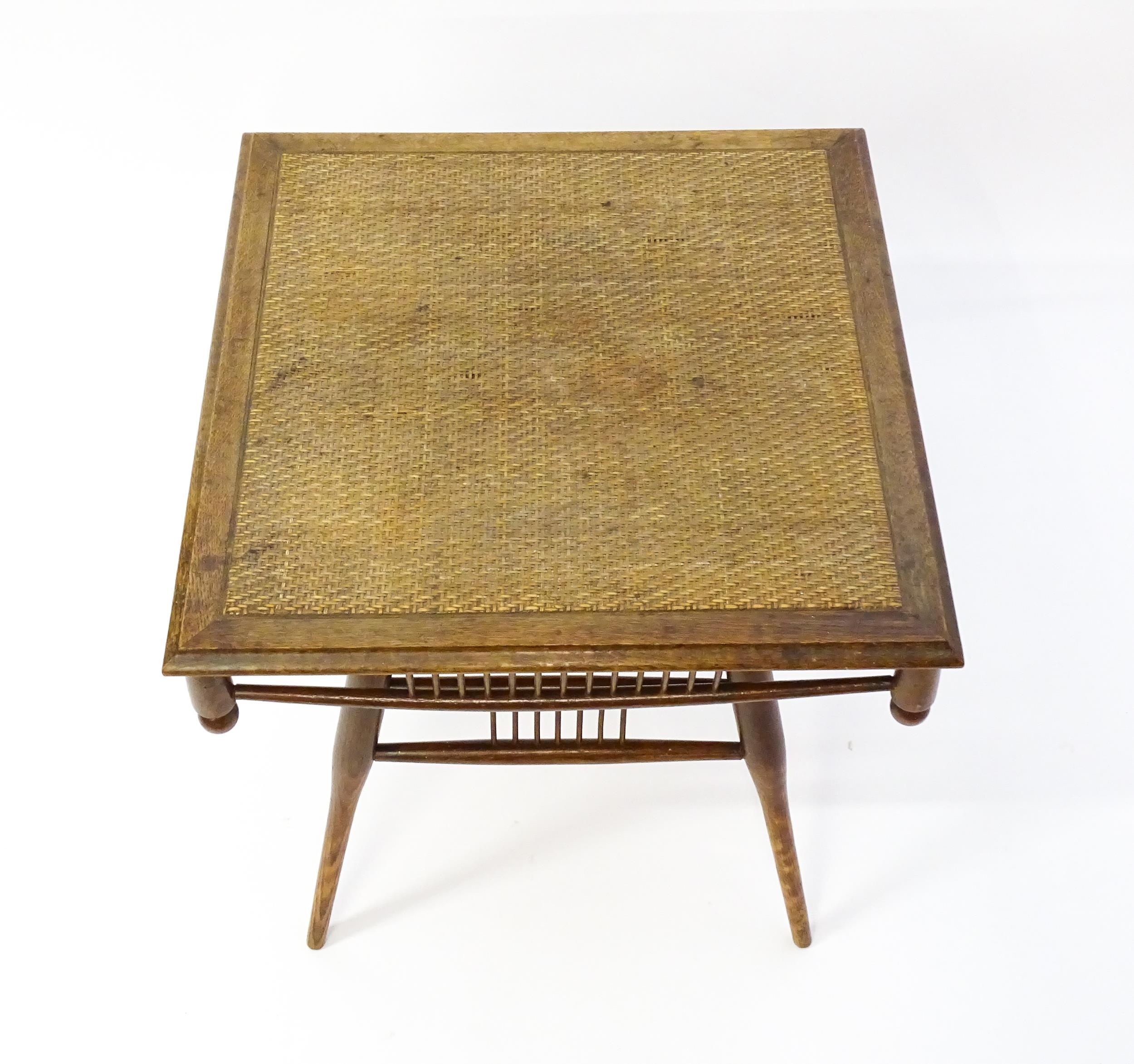 An unusual late 19thC Arts & Crafts table with a rattan inlaid moulded top above three tiers of - Image 6 of 10