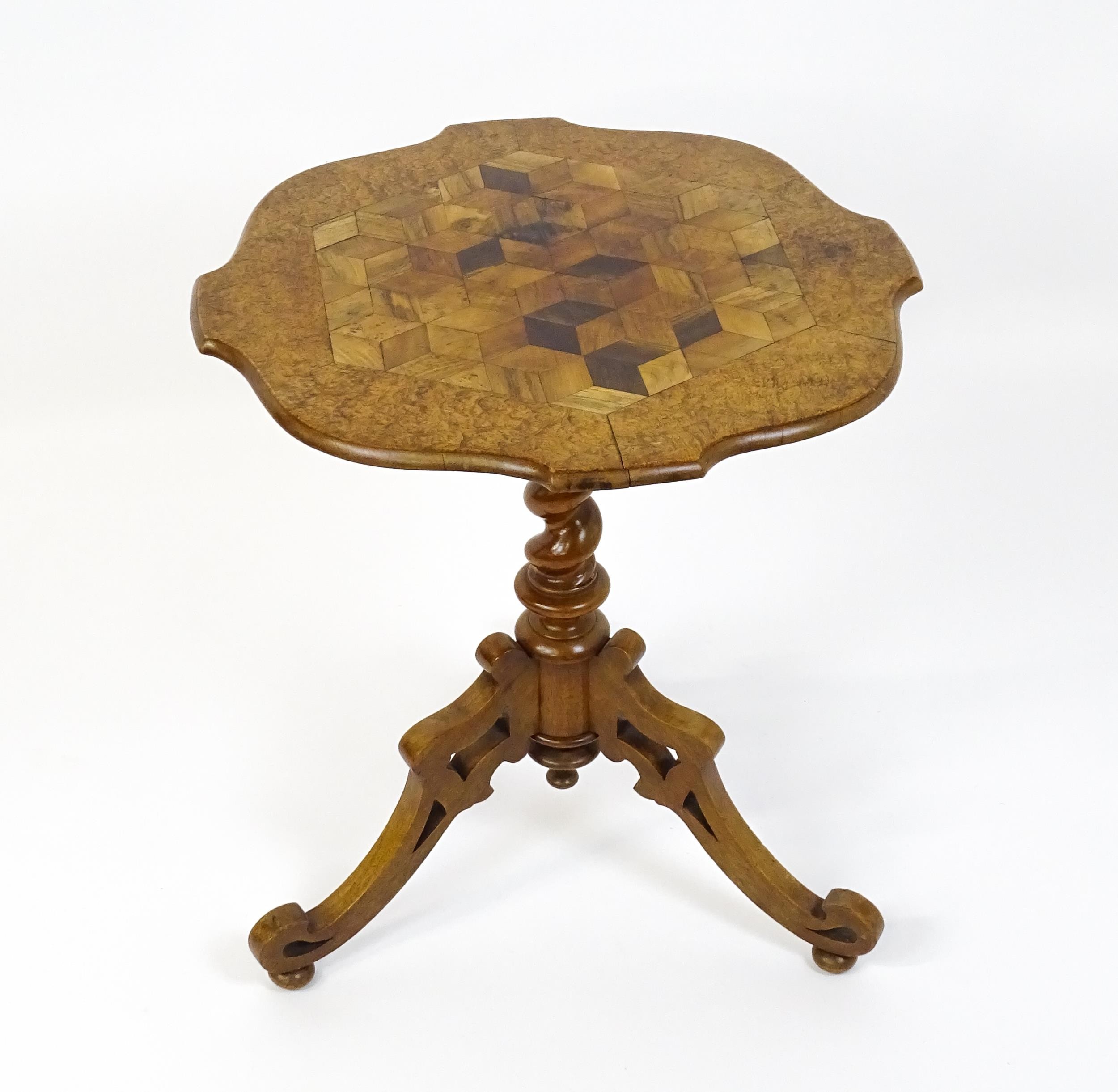 A 19thC tripod table with a burr amboyna veneered top surrounding a central parquetry style sample - Image 9 of 10