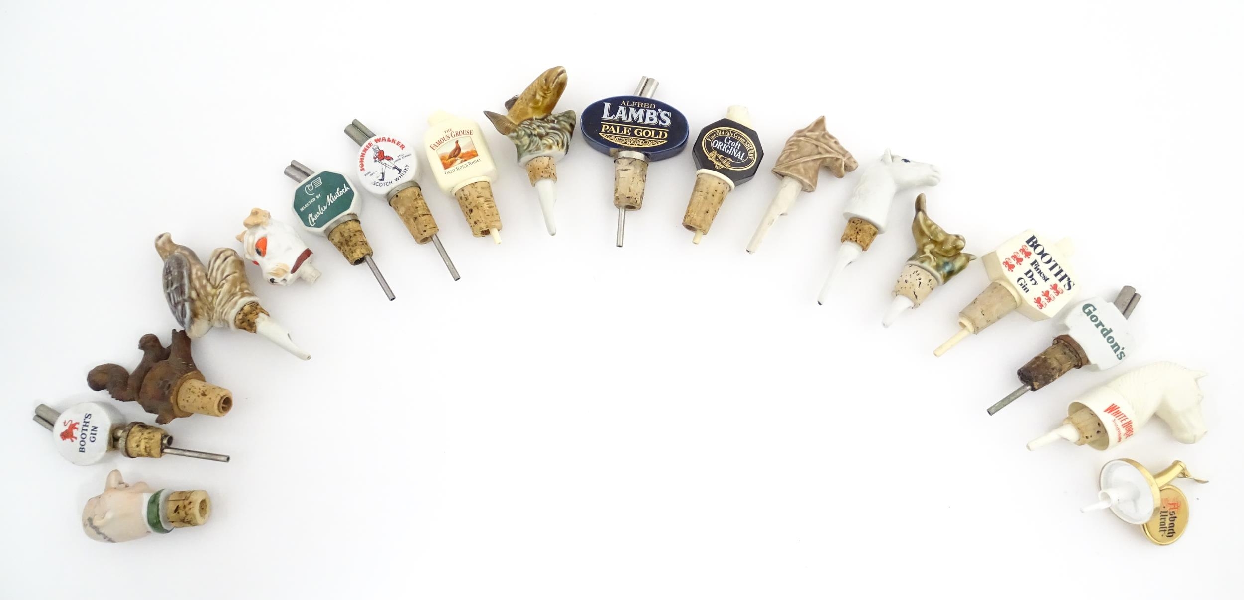 Breweriana : A quantity of assorted 20thC advertising bottle stoppers / pourers to include Booth's