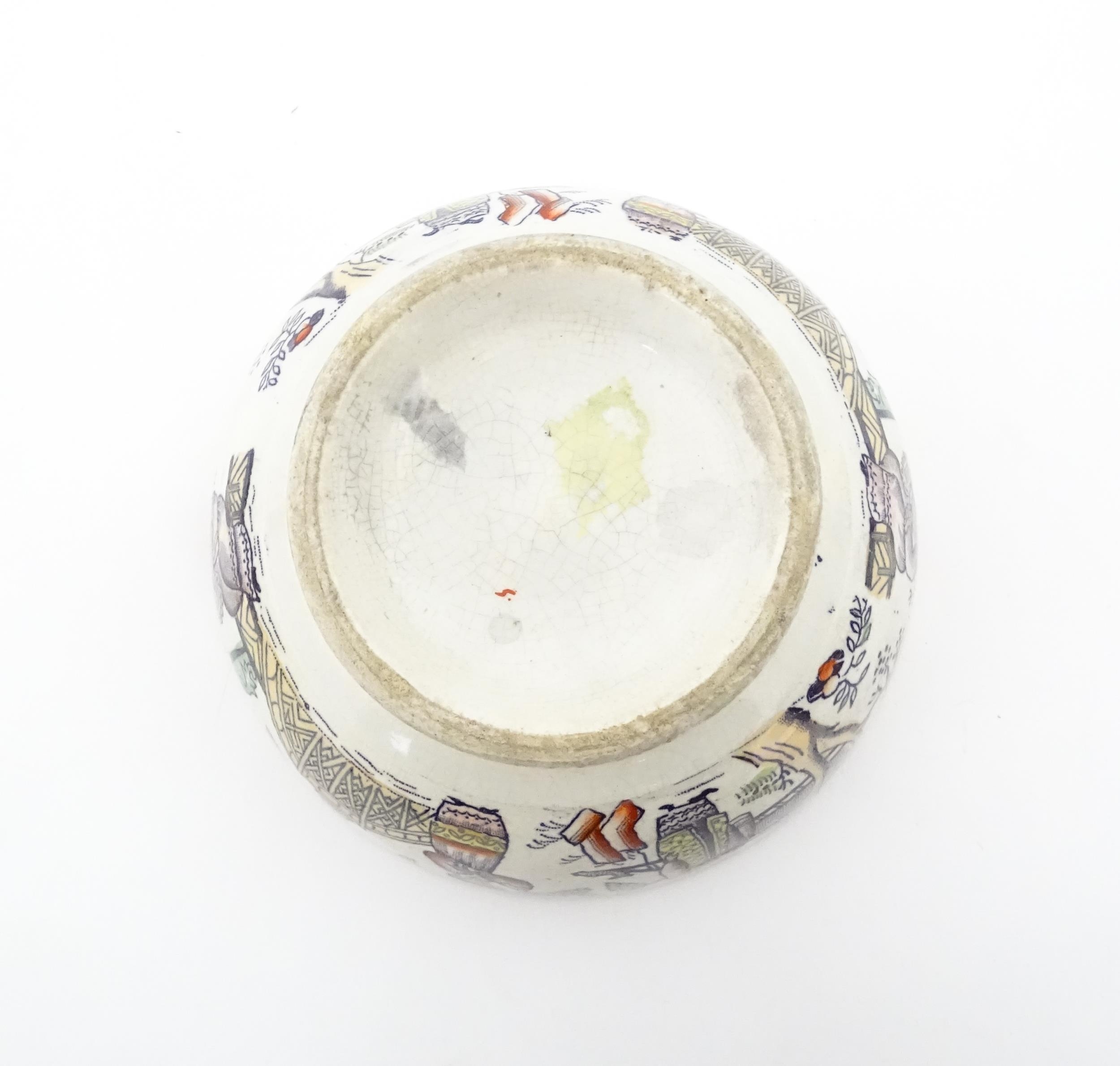 A Scottish bowl with Chinoiserie depicting figures in a landscape. Possibly Bell's Pottery. - Image 7 of 11