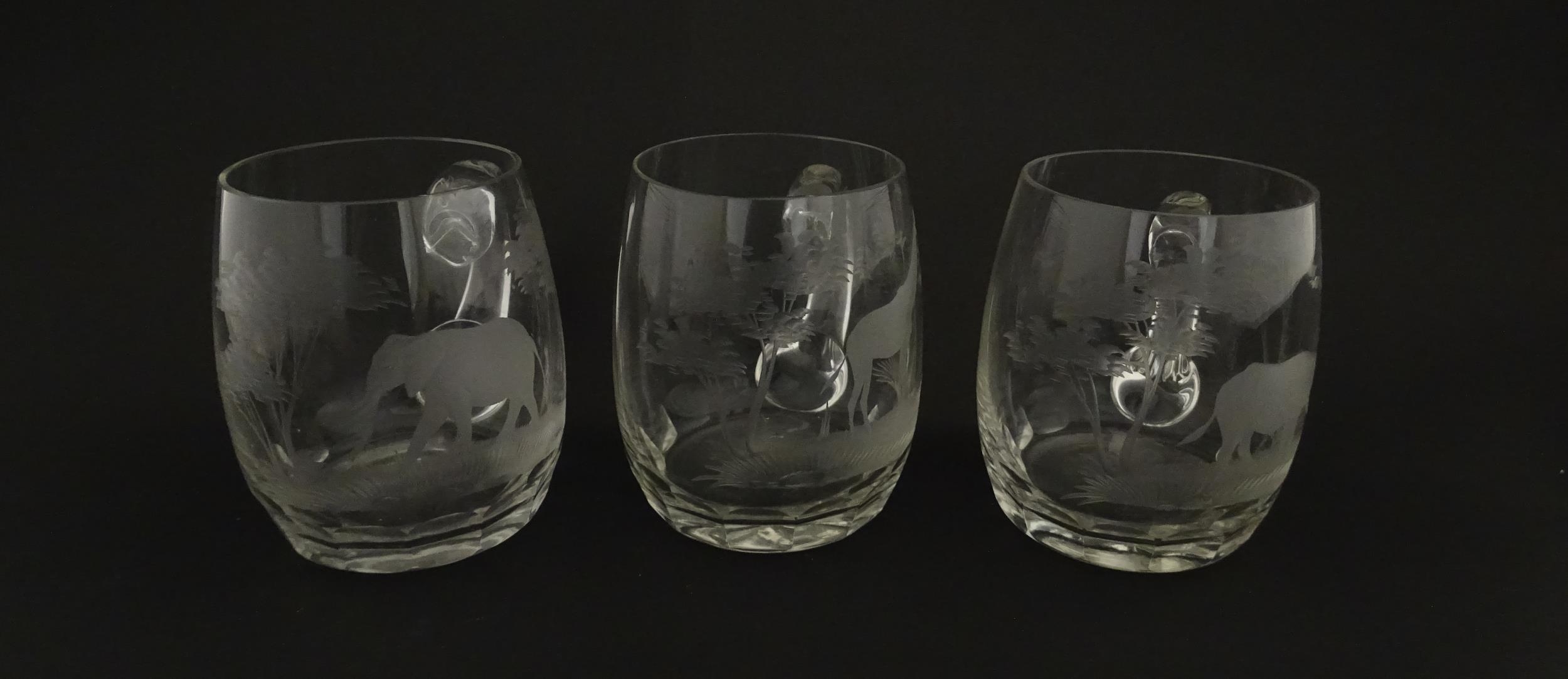 Seven Rowland Ward pint mugs / glasses with engraved Safari animal detail. Unsigned. Approx. 4 1/ - Image 22 of 26