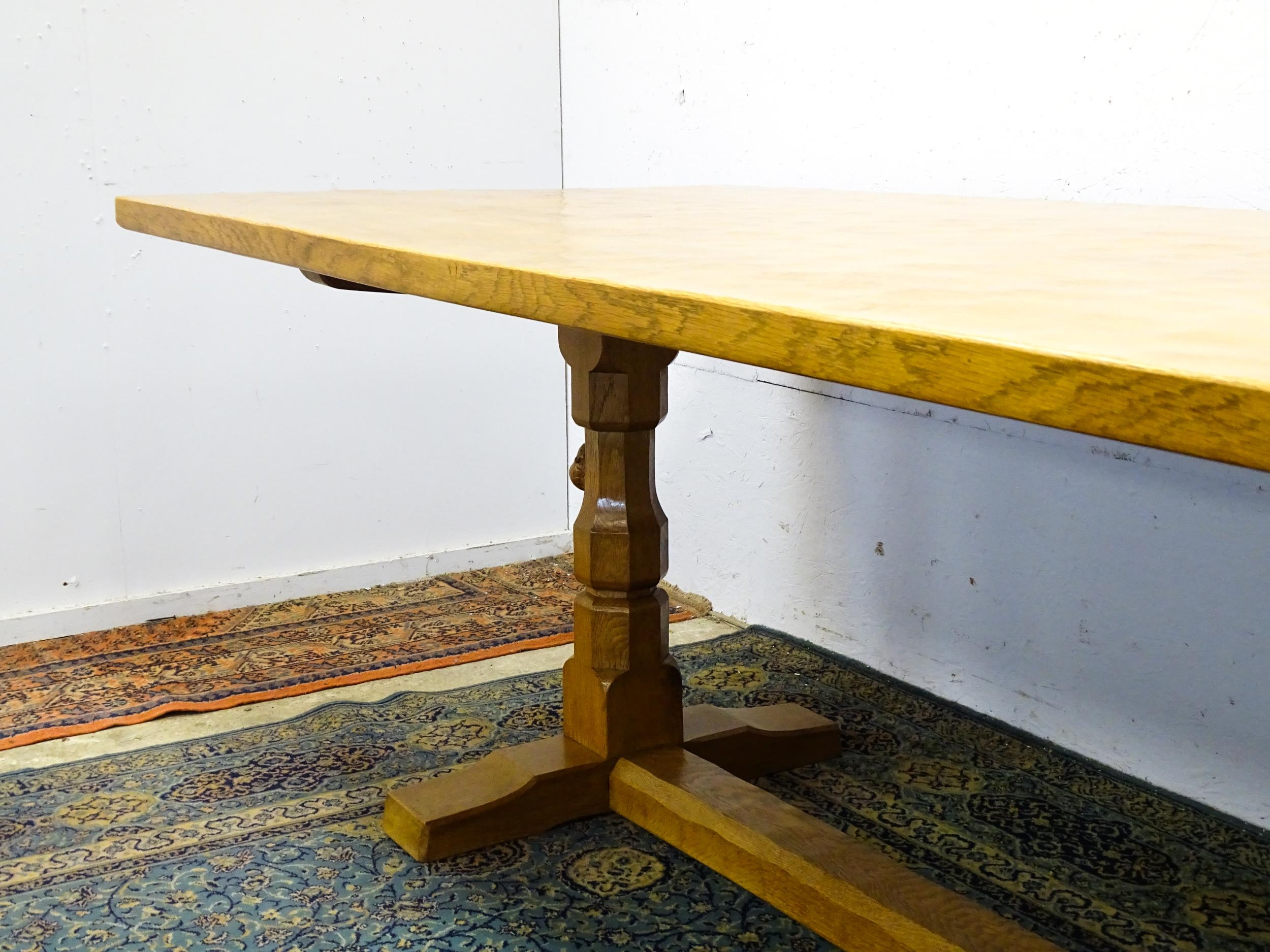 A mid 20thC Robert 'Mouseman' Thompson dining table. The 8ft long oak table top with an adzed finish - Image 22 of 22