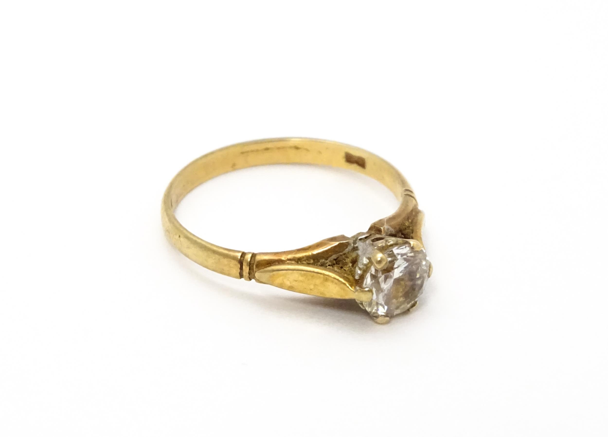 A 9ct gold ring set with white stone solitaire. Ring size approx. N Please Note - we do not make - Image 5 of 7