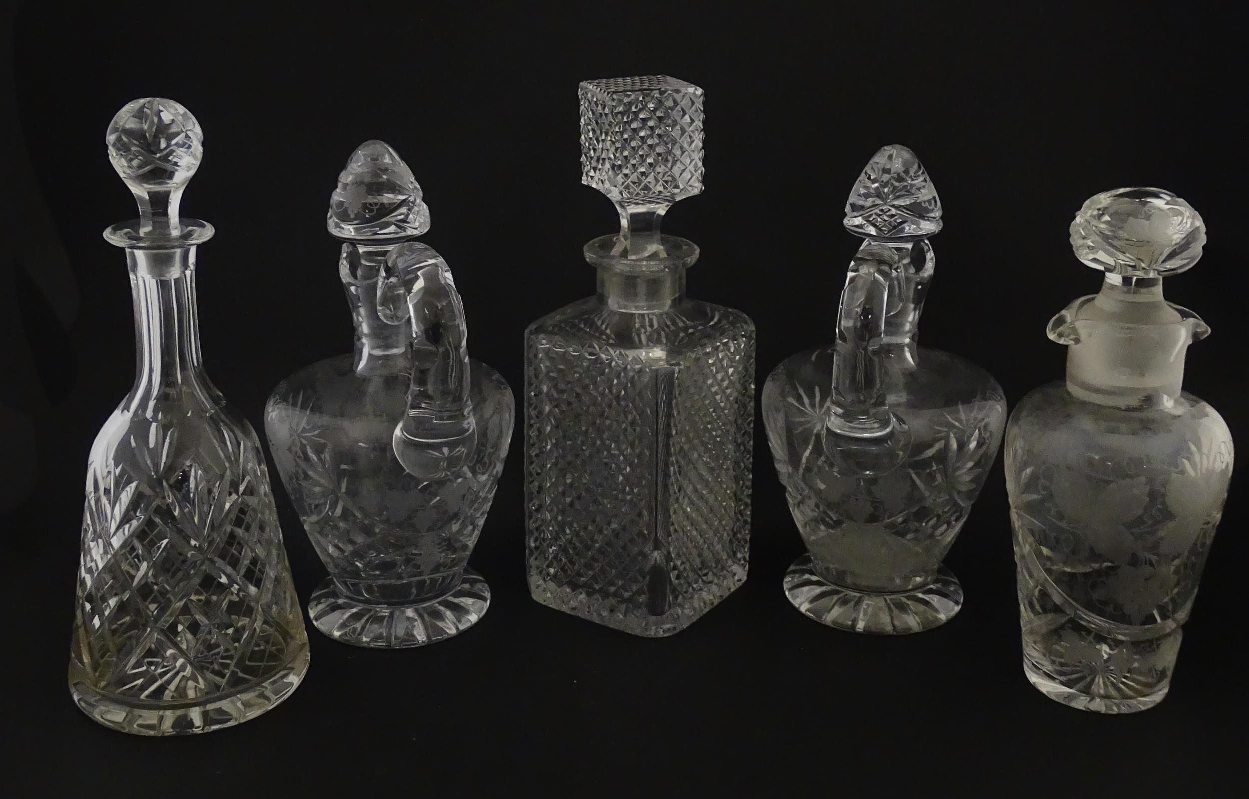 A quantity of assorted cut glass decanters, claret jugs, etc. Largest approx. 11 1/4" high (5) - Image 7 of 10