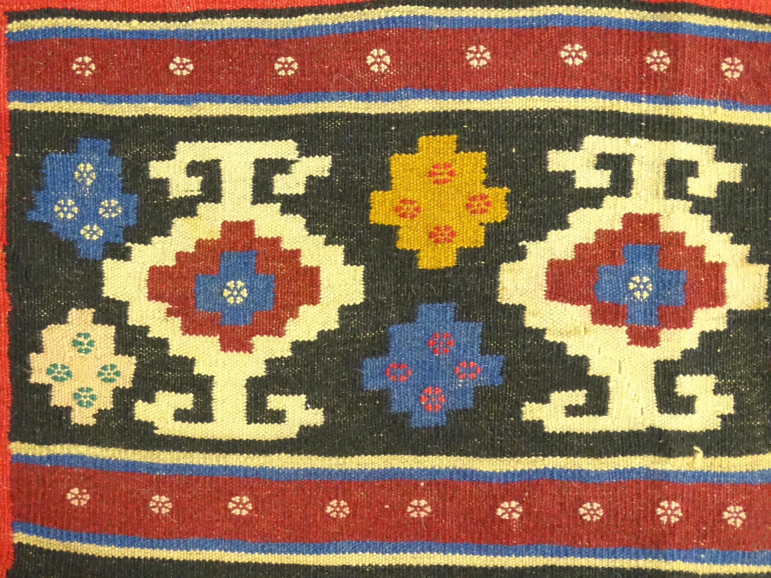 Carpet / Rug : A North East Persian Sumak kilim rug with banded geometric decoration. Approx. 79" - Image 5 of 7