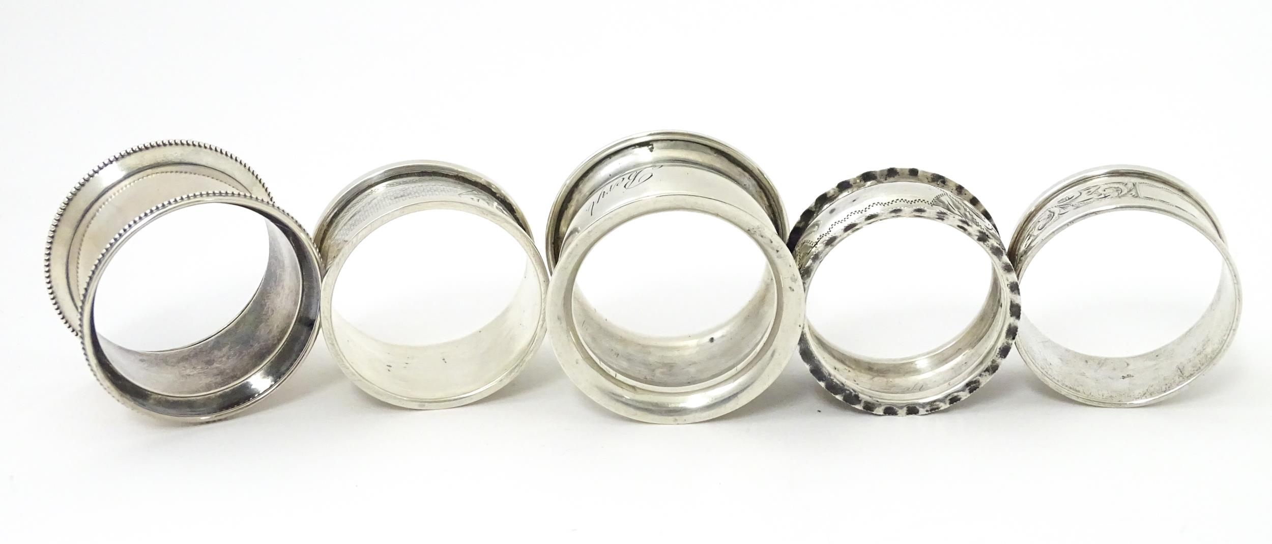 Five assorted silver napkin rings various dates and makers (5) Please Note - we do not make - Image 2 of 10