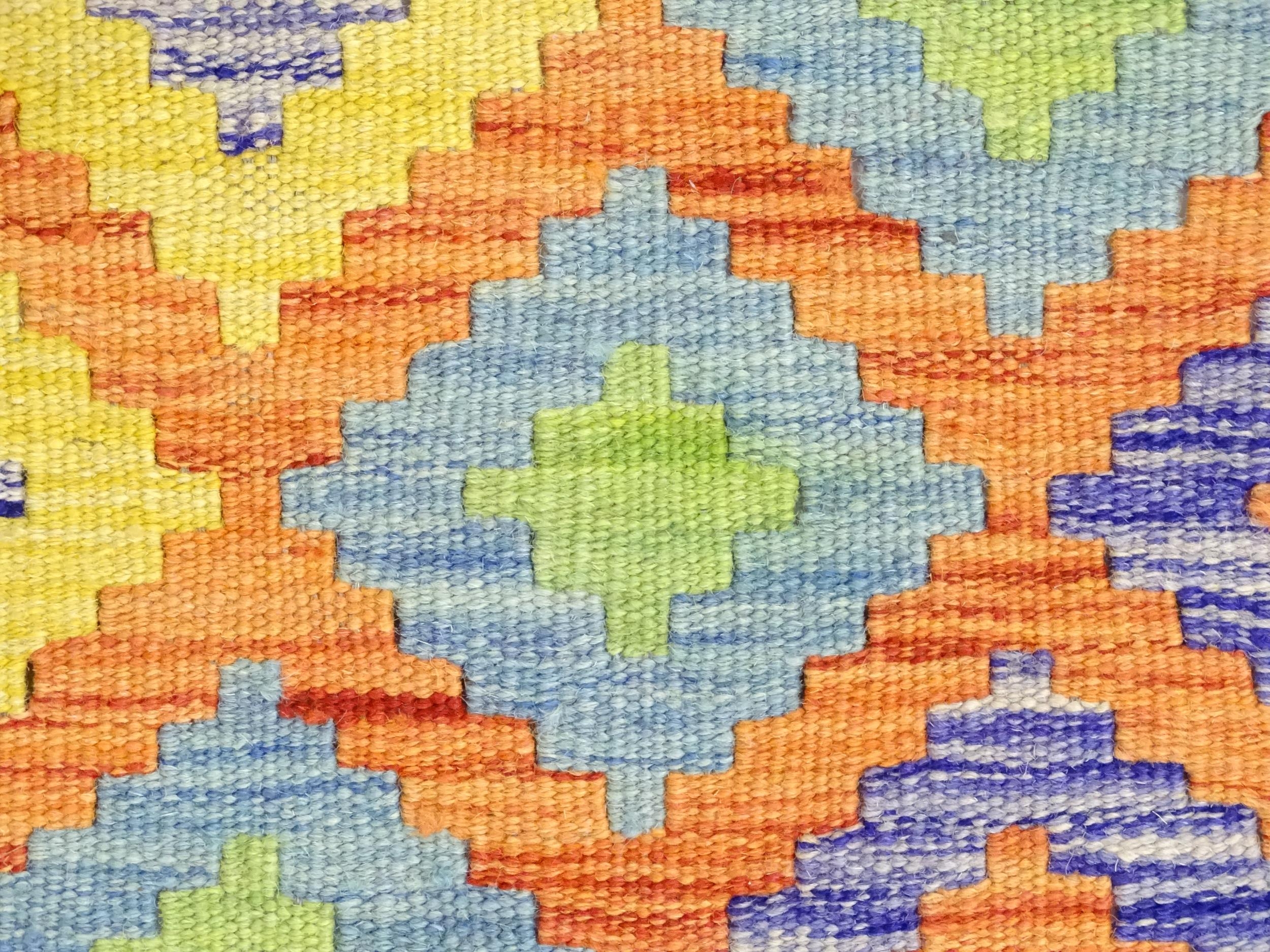 Carpet / Rug : A Turkish Anatolian kilim rug with repeated geometric motifs. Approx. 84" x 59" - Image 6 of 6