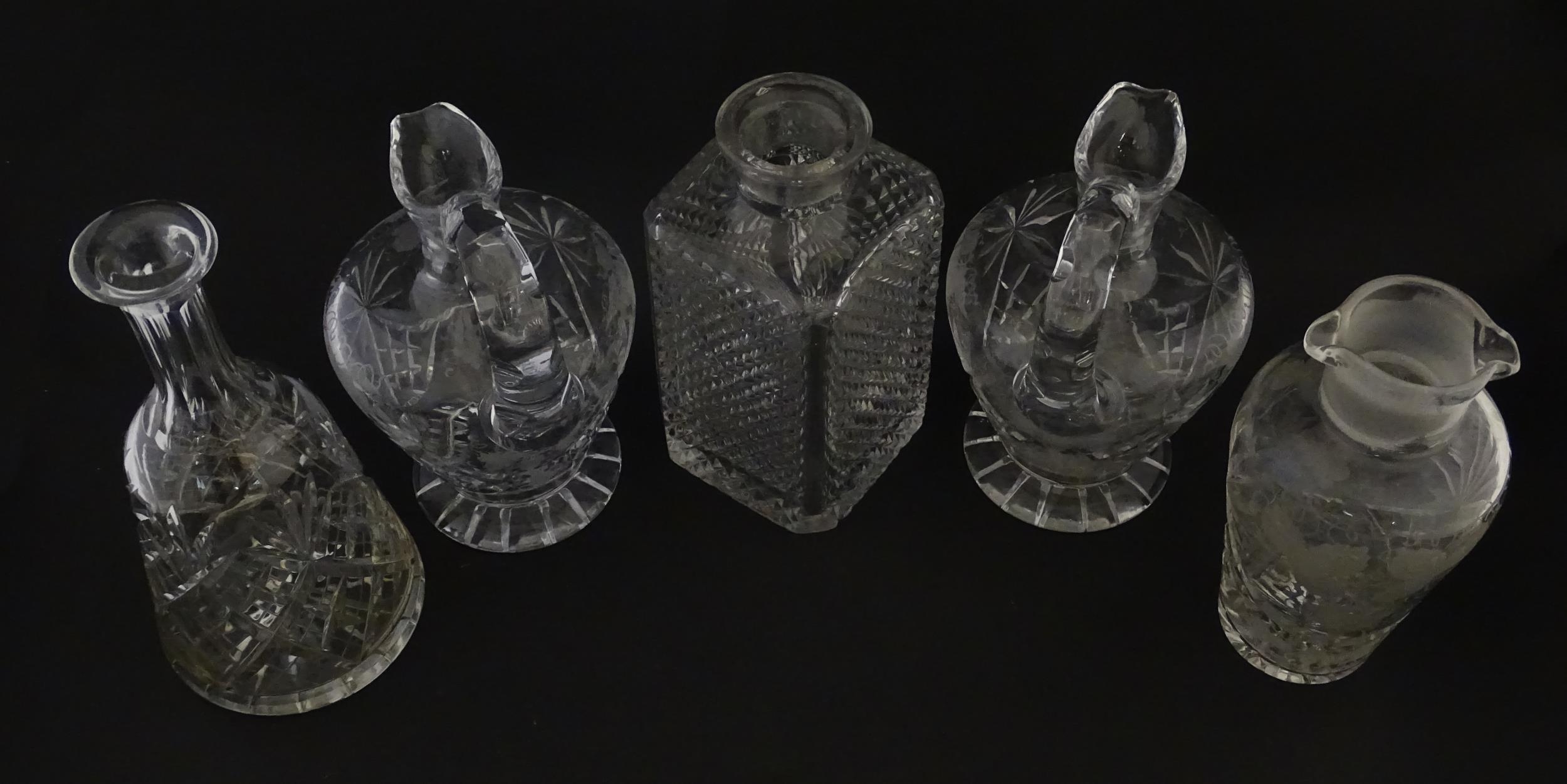 A quantity of assorted cut glass decanters, claret jugs, etc. Largest approx. 11 1/4" high (5) - Image 9 of 10