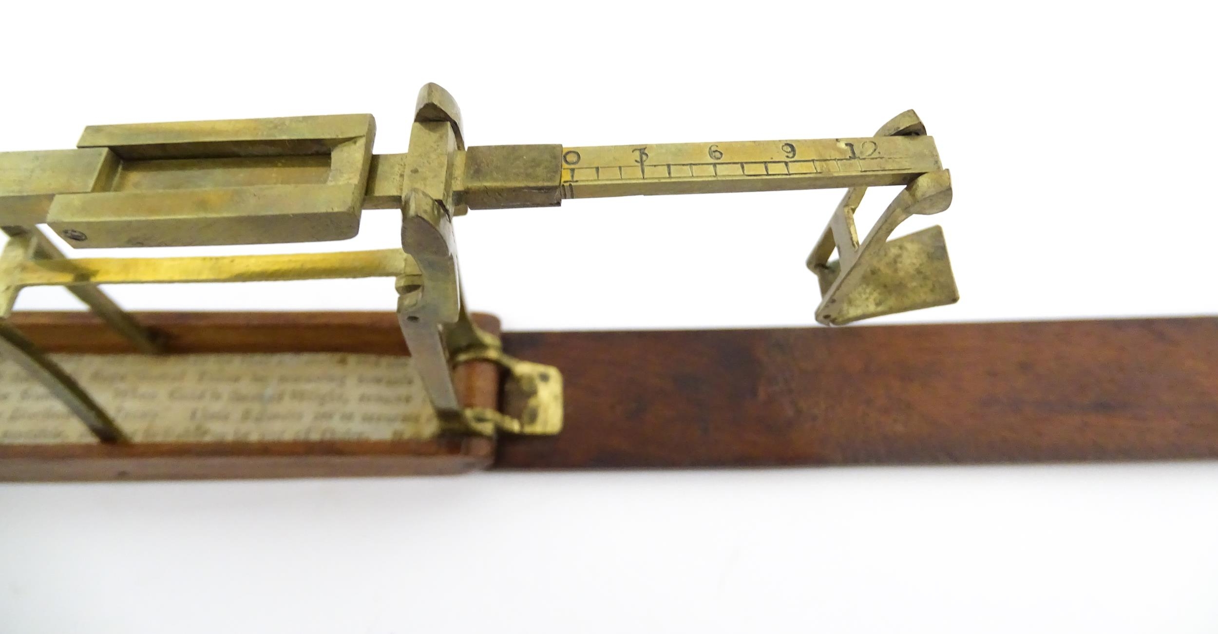 A 19thC mahogany cased brass folding guinea / coin scale. Case approx. 5 1/2" long Please Note - - Image 10 of 11