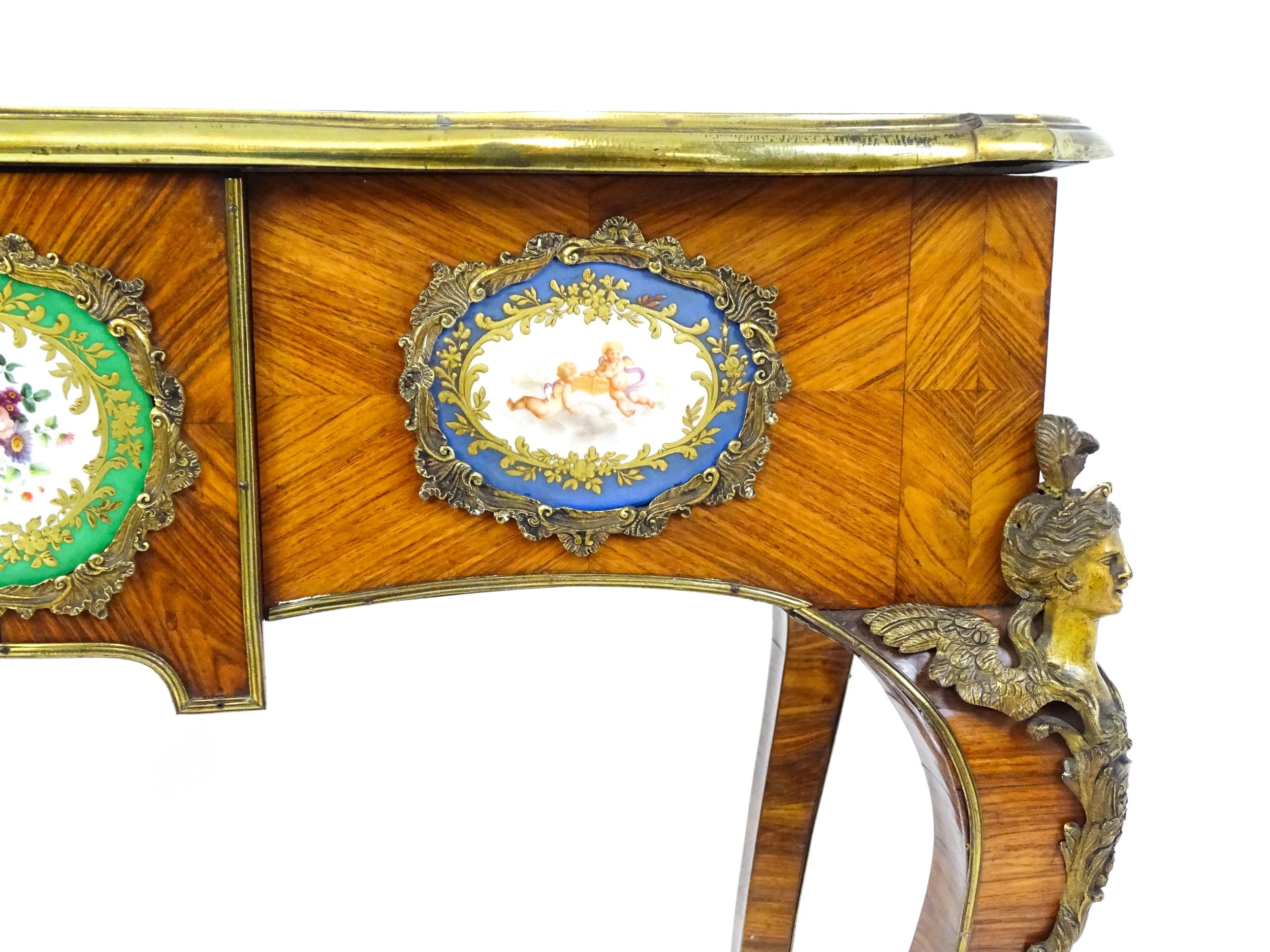 A mid 19thC kingwood side table with a brass moulding to the top edge and three Sevres style plaques - Image 10 of 14