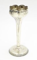 A silver bud vase hallmarked Birmingham 1904. Approx. 7 1/2" high Please Note - we do not make