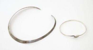 A silver bracelet together with a silver necklace (2) Please Note - we do not make reference to